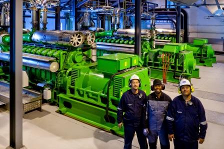 Clarke Energy service engineer with customer at the Tronox furnace gas CHP facility in South Africa