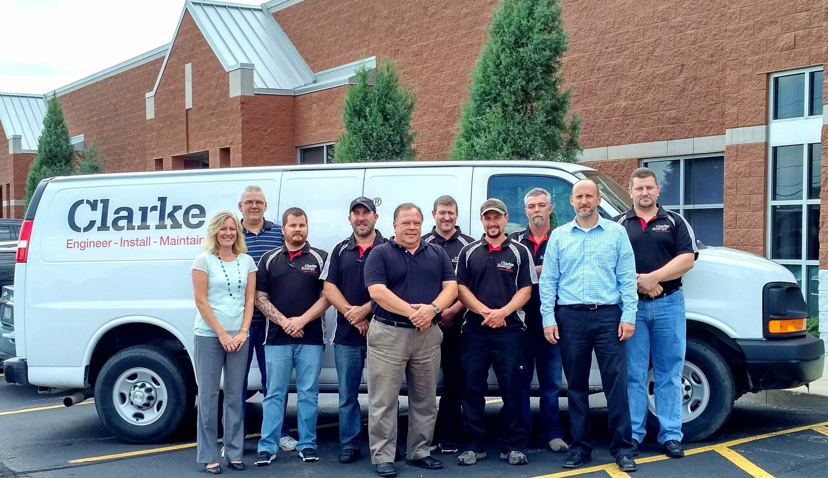 A photograph of the new members of Clarke Energy's US operations and a Clarke Energy service van