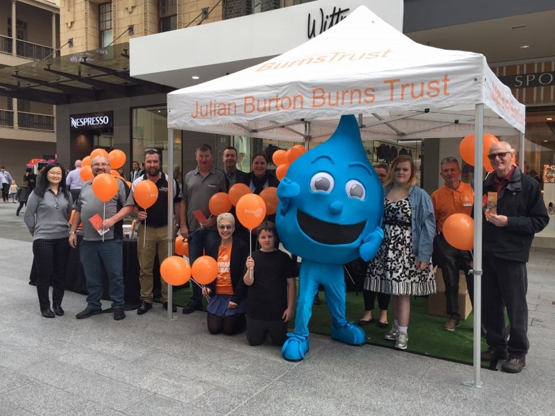 A photograph of the Clarke Energy morning and lunch crew at the Julian Burton Burns Trust Charity stall 