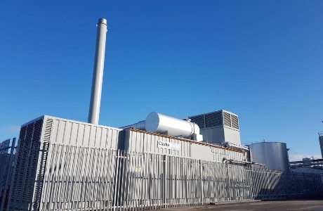 A photograph of Caledonian Cheese's containerised CHP plant in Stranraer, Scotland supplied via base power