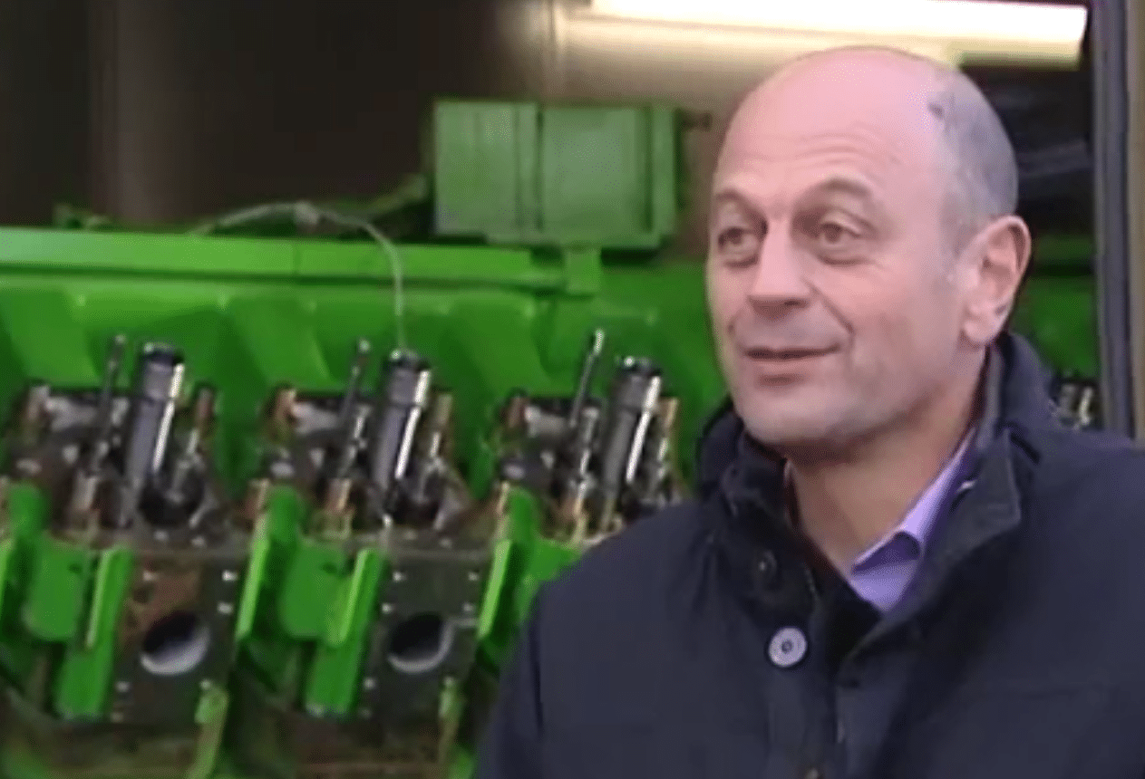 Didier Lartigue and Jenbacher gas engine background