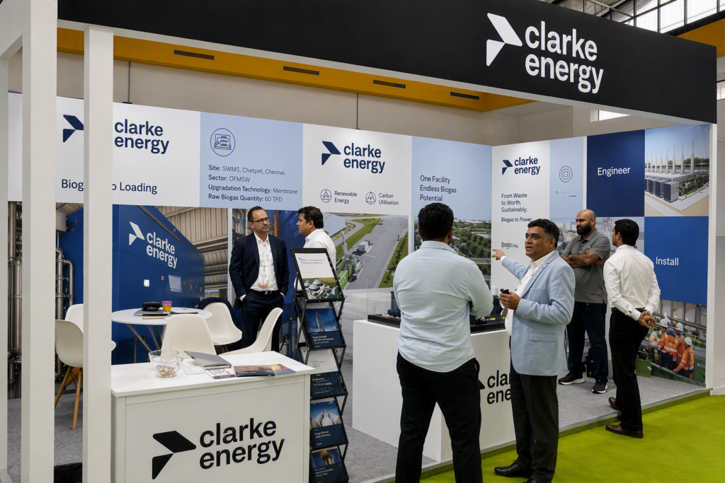 Colleagues at Clarke Energy India at Eco Sustain Expo. Image shows the Clarke Energy stand and people having conversations.