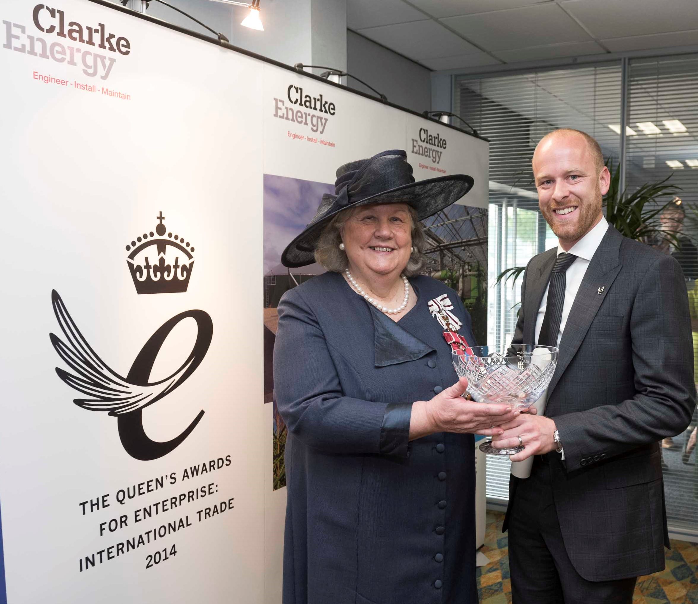 Clarke Energy Kirkby receive the Queens Award for Enterprise International Trade from Dame Lorna Muirhead, Lord Lieutenant of Merseyside and Jamie Clarke CEO of Clarke Energy