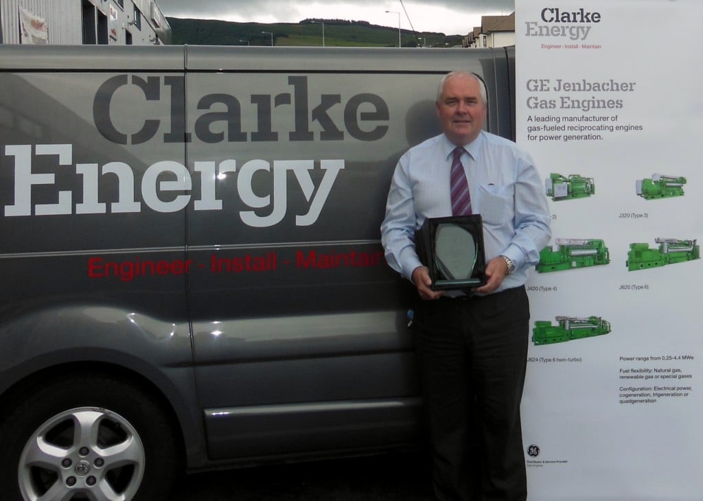 John Curley with Prize in front of Irish Clarke Energy service van